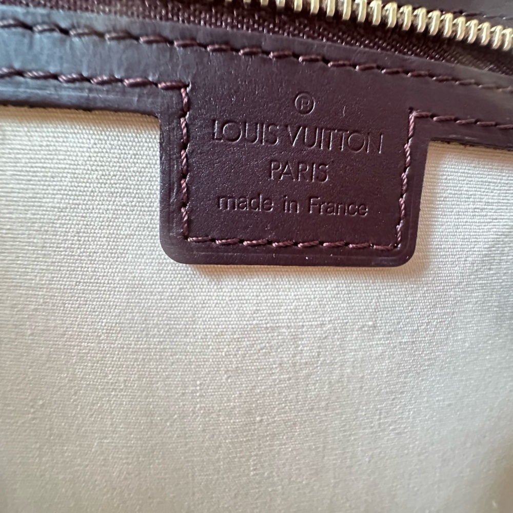 Louis Vuitton Gold and Brown Lock Accent